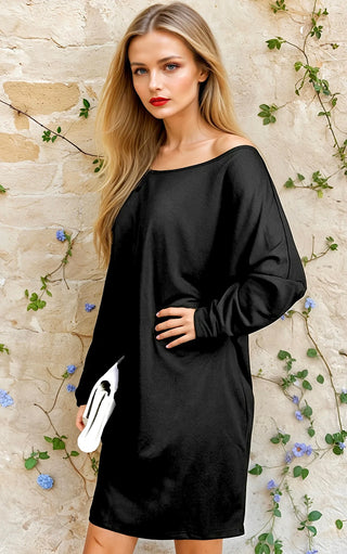 Side view of Easy Breezy Black Dress, flowy dolman sleeve and flattering drape, versatile knit black dress for casual or dressy wear