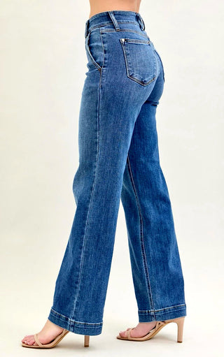 Side view of Everly Wide-Legged Jeans by Judy Blue showing the high-rise fit, double button closure, and dark wash denim.