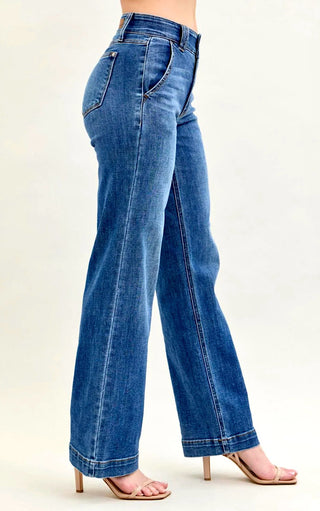 Side view of Everly Wide-Legged Jeans by Judy Blue showing the high-rise fit, double button closure, and dark wash denim.