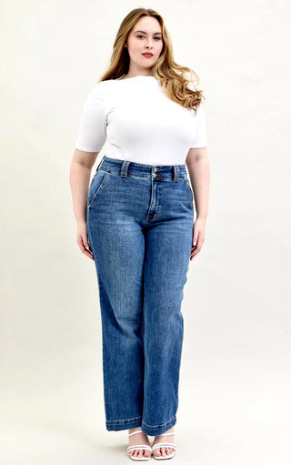 Curvy Model wearing Everly Wide-Legged Jeans by Judy Blue with a white tee, showcasing the wide-leg silhouette and 4-way stretch denim.