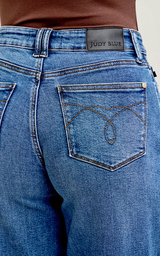 Close-up detail of back pocket stitching on Arabella Soft Barrel Cut Jeans by Judy Blue.