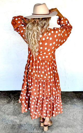 Back view of the Autumn Muse Dress, showing the flowy tiers and all-over polka dot pattern.