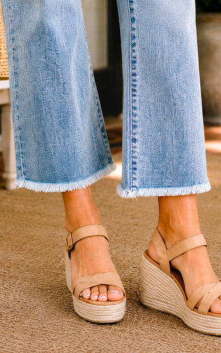  Close-up of the raw edge hem on Judy Blue cropped kick flare jeans.