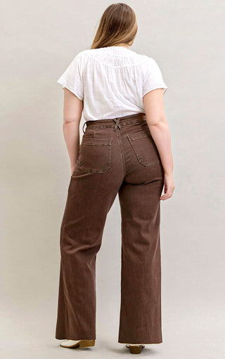 Curvy model back view in Judy Blue Chestnut Brown Wide Leg Jeans highlighting wide leg cut and stretch denim.