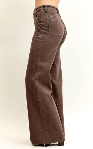Side view of model wearing autumn Judy Blue  Brown Wide Leg Jeans with wide leg silhouette.