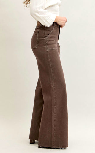 Side view of model wearing Judy Blue Chestnut Brown Wide Leg Jeans with wide leg silhouette.