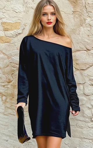 Video of model wearing the Easy Breezy Black Dress with boat neckline and dolman sleeves, showing the flow and drape of the black knit fabric